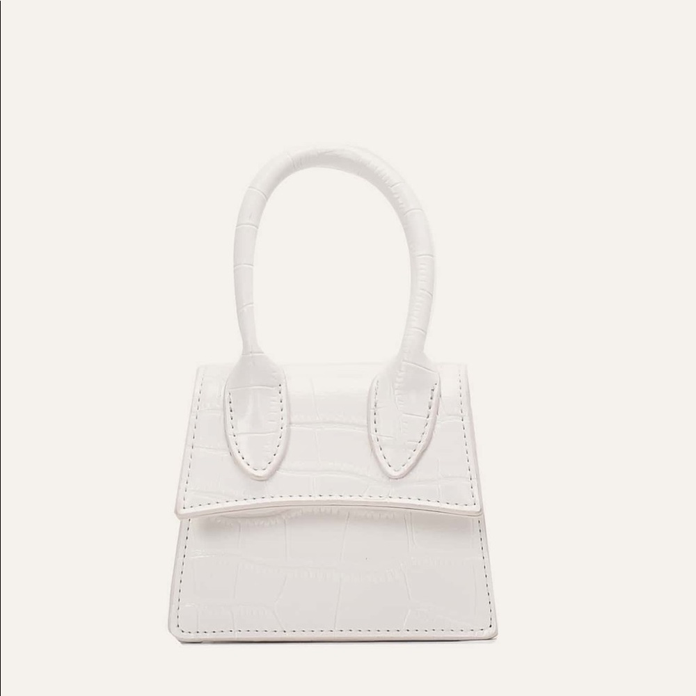 Small white bag comes with strap brand new